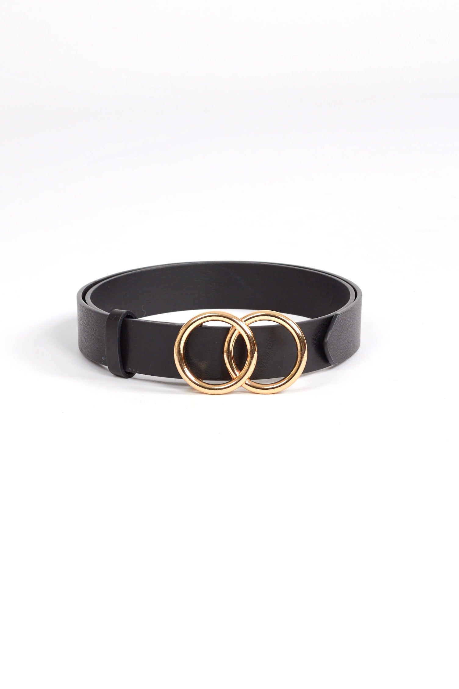 Black vegan leather belt with gold toned metal double circle belt buckle. Free shipping on domestic orders over $75. Afterpay available. We ship worldwide!